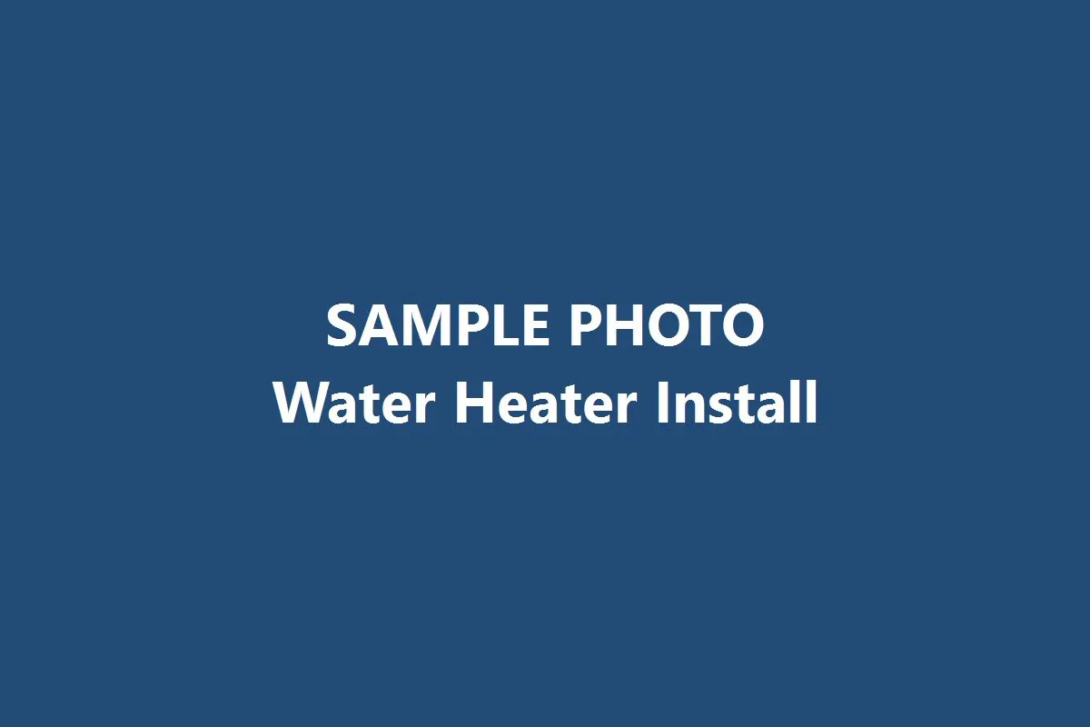 Technician installing a new tankless water heater in a garage